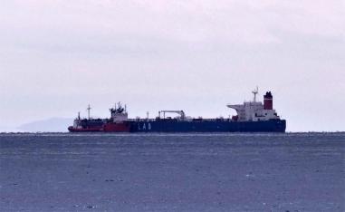 The seized oil tanker Lana is seen anchored off the shore of Karystos