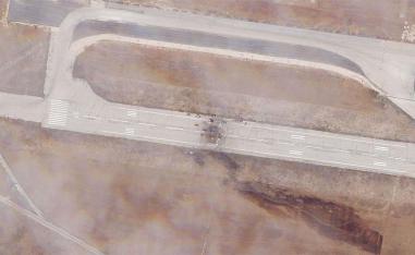 The runway damage after an Israeli strike targeted the Aleppo International Airport