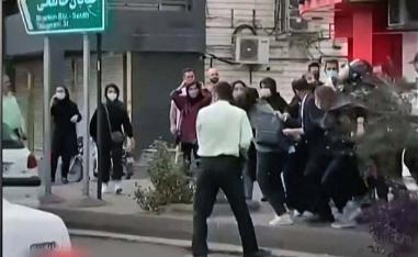 Female protesters are being roughly handled by Iranian security forces in the city of Rasht