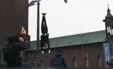 Swedish FM says the portrayal of an executed elected President outside City Hall is deplorable