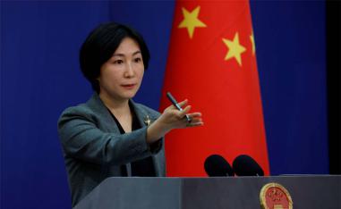 Ning says freedom of religious belief should be respected