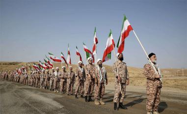 Britain says the sanctioned IRGC officials are responsible for managing the group's financial investments