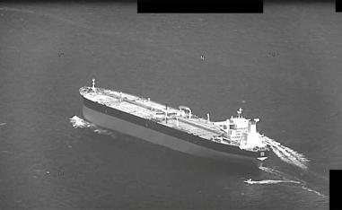 Fast-attack crafts from Iran's Islamic Revolutionary Guard Corps Navy swarming Panama-flagged oil tanker Niovi as it transits the Strait of Hormuz
