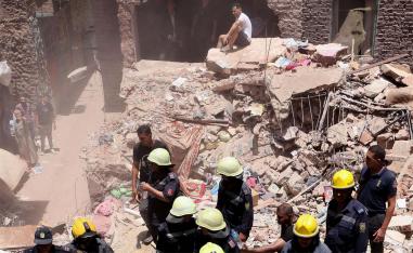 The rubble of a five-story apartment building that collapsed
