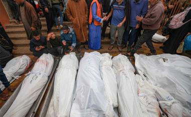 Palestinians mourn the death of loved ones following Israeli bombardment in the southern Gaza Strip