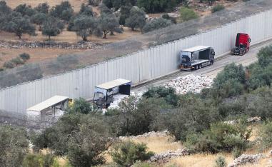 Israeli settlers attacked the trucks and they destroyed the products and set fire in trucks