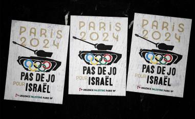Posters saying No Olympics for Israel are pictured in the 18th arrondissement district in Paris