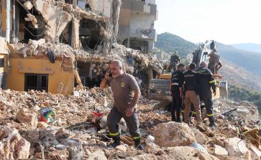 The aftermath of Israeli strike on Barja
