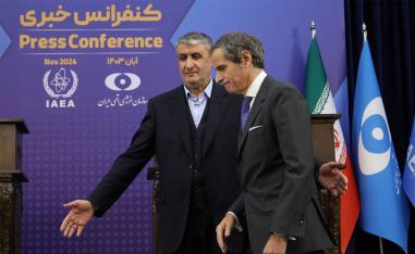 IAEA Director General Rafael Mariano Grossi and Head of Iran's Atomic Energy Organization Mohammad Eslami