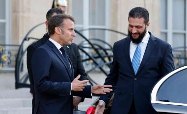 Macron welcoming Sharaa