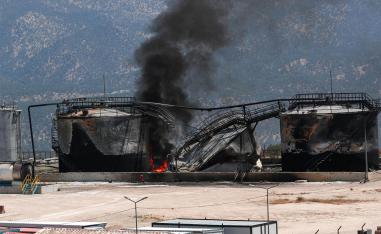 Smoke billows from a damaged oil installation at the Sarsang oil field following a drone attack on the Chamanke district in Iraq's Kurdistan