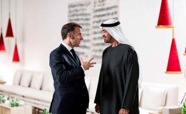 Emirati President Sheikh Mohamed bin Zayed Al Nahyan speaks with French President Emmanuel Macron after a lunch meeting at the Zayed National Museum , Saadiyat Island, Abu Dhabi, December 21, 2025. 