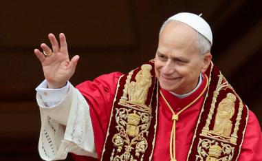 Pope Leo XIV gestures after delivering the traditional Christmas Day Urbi et Orbi speech to the city and the world from the main balcony of St. Peters Basilica at the Vatican, December 25, 2025. 
