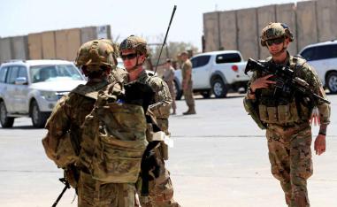 US soldiers are seen during a handover ceremony of Taji military base from US-led coalition troops to Iraqi security forces, in the base north of Baghdad, August 23, 2020. 