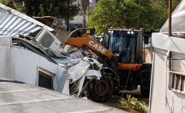 Bulldozers razed several large buildings and other smaller structures inside UNRAW’s compound