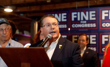 Facing calls to resign