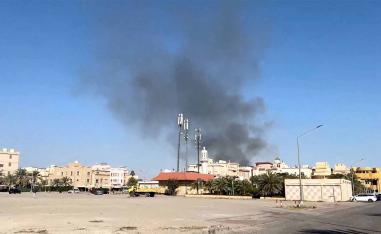 Smoke rises from an area surrounding the US Embassy in Kuwait following an Iranian strike