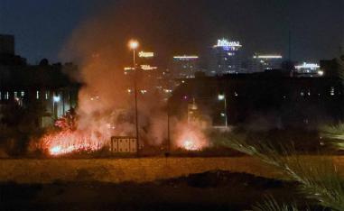 Smoke rises after an explosion at the US Embassy compound in Baghdad