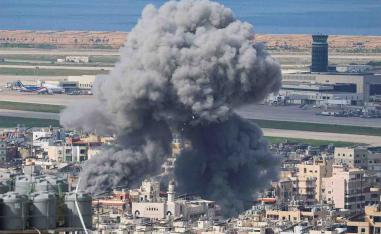 Smoke rises after an Israeli strike on Beirut's southern suburbs
