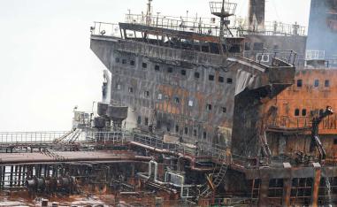 A foreign tanker carrying Iraqi fuel oil damaged after catching fire in Iraq's territorial waters