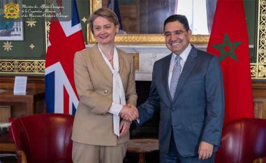 Cooper shaking hands with Bourita in London