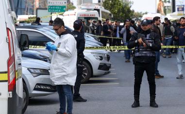 A forensic expert at the scene after gunfire was heard near the building housing the Israeli consulate in Istanbul