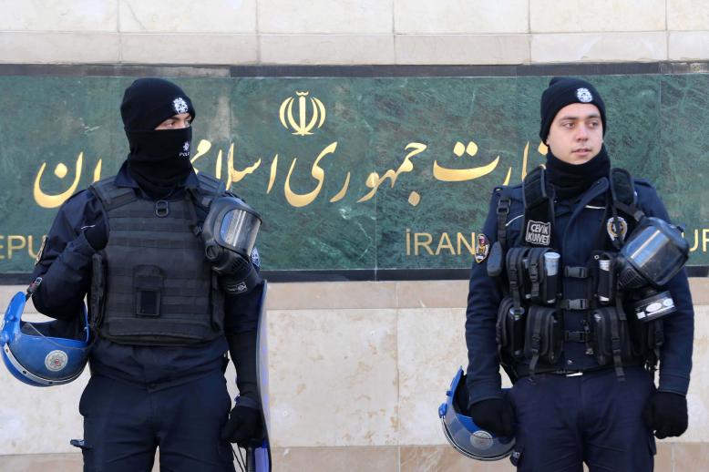 Turkish riot police stand guard in front of the Iranian Embassy during a protest against Iran's role in Aleppo, in Ankara, on December 15, 2016