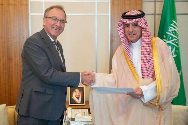 Saudi Foreign Minister Adel Al-Jubeir (R) shakes hands with German Ambassador to Saudi Arabia Joerg Ranau during their meeting in Riyadh
