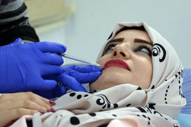 The religious police of IS enforced ultra-strict rules on dress for all residents