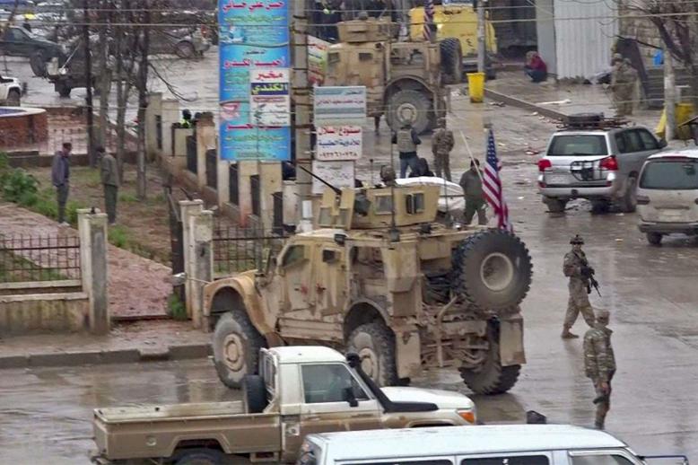 The scene of the suicide attack in Manbij