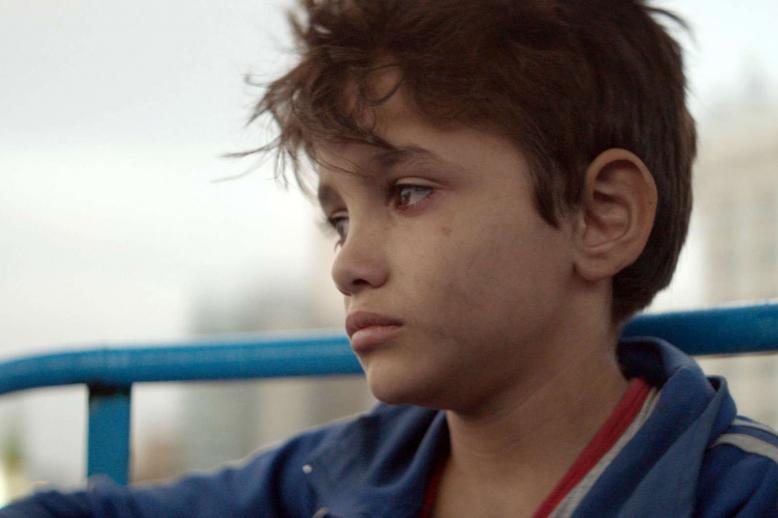 The protagonist is played by a young Syrian refugee, while another young cast member was thrown in jail during the shoot