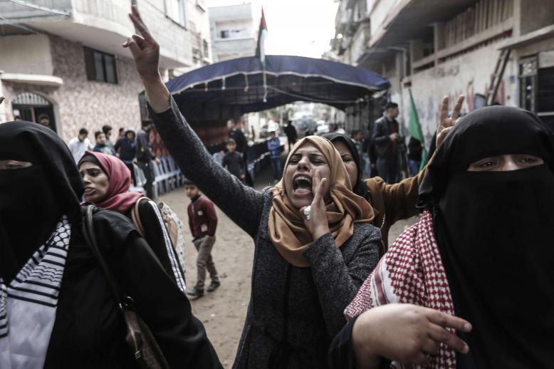 The clashes come a day after a Gaza woman was shot dead by Israeli forces during weekly protests
