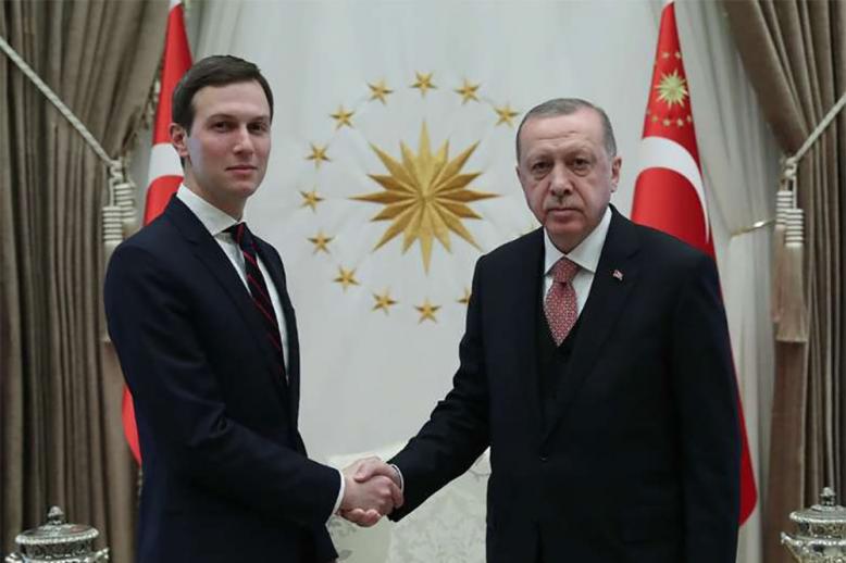 Turkish President Recep Tayyip Erdogan (R) shakes hands with Jared Kushner