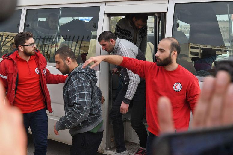 The prisoner exchange was supervised by Syrian Red Crescent staff 