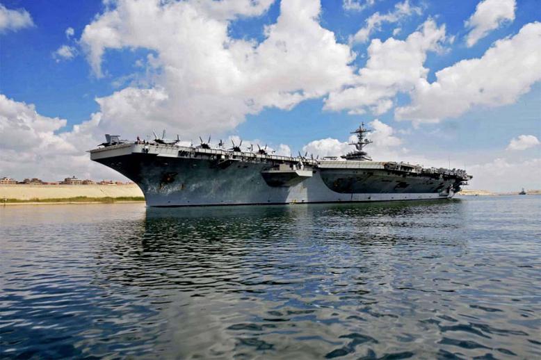 USS Abraham Lincoln sailing south in the Suez canal near Ismailia city east of Cairo