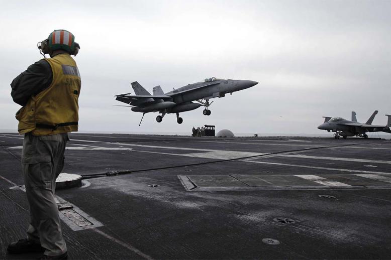 US fighter jet lands on the USS Abraham Lincoln aircraft carrier 