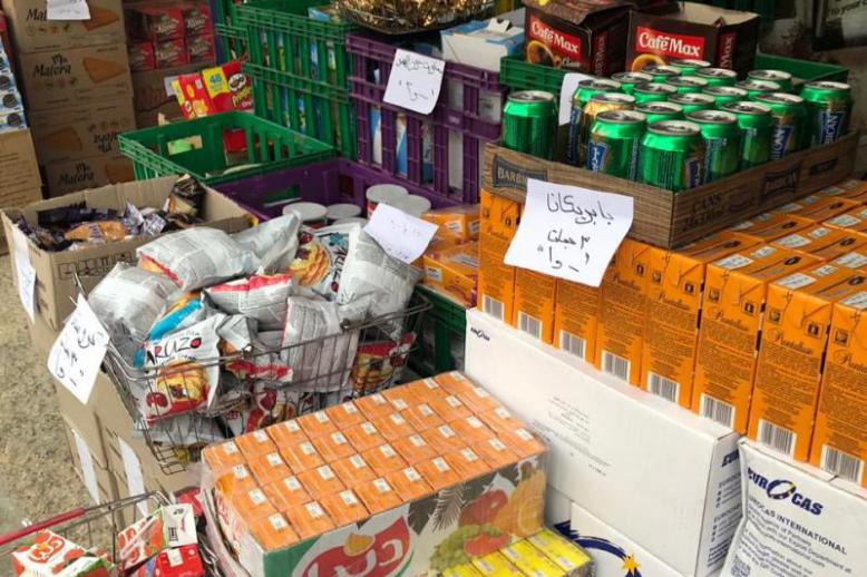 Food products nearing expiry on display at a market in Amman