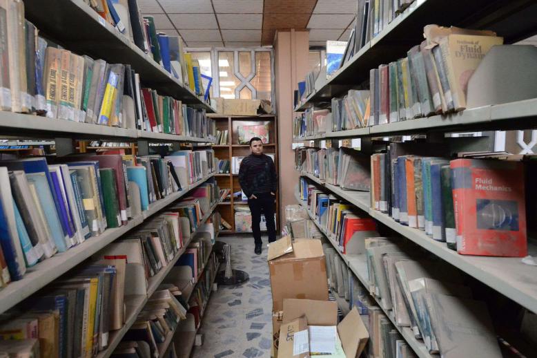 Although Mosul has been back in government hands since 2017, its young academics see the barren bookshelves as part of IS's dark legacy