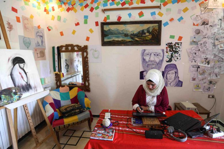 Before civil war erupted in 2011, Ali worked as an art teacher at a private school in Idlib so she could "be close to the field that I love"