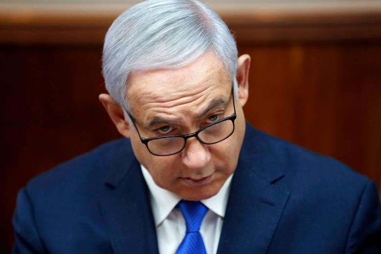 The veteran premier is engaged in a tough re-election campaign while facing the possibility of being indicted for corruption