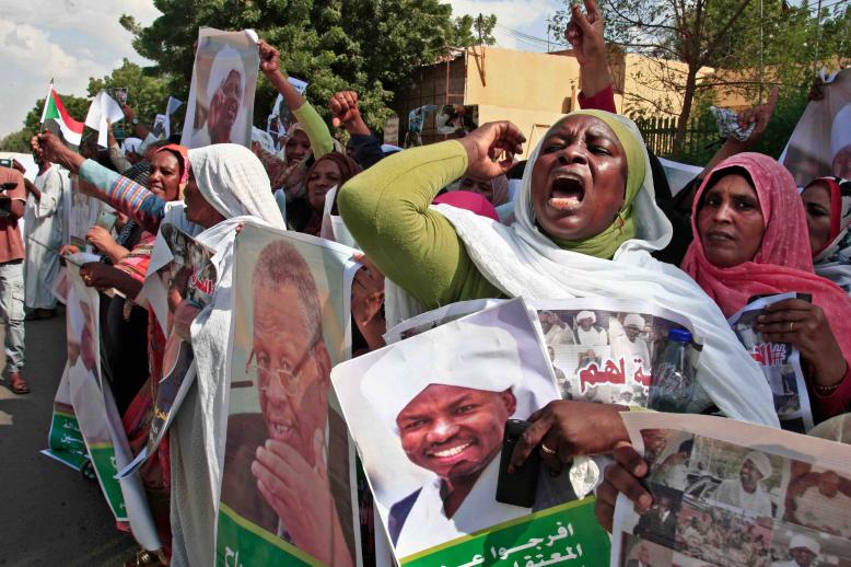 "Down with the Forces of Freedom and Change," the crowd chanted, referring to the umbrella protest movement that brought down Bashir.