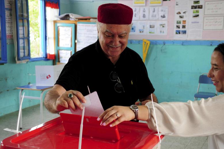Sunday's vote for parliament is sandwiched between two rounds of a presidential election