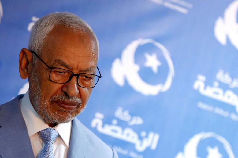 Rached Ghannouchi, leader of Tunisia's moderate Islamist Ennahda Party attends a news conference in Tunis