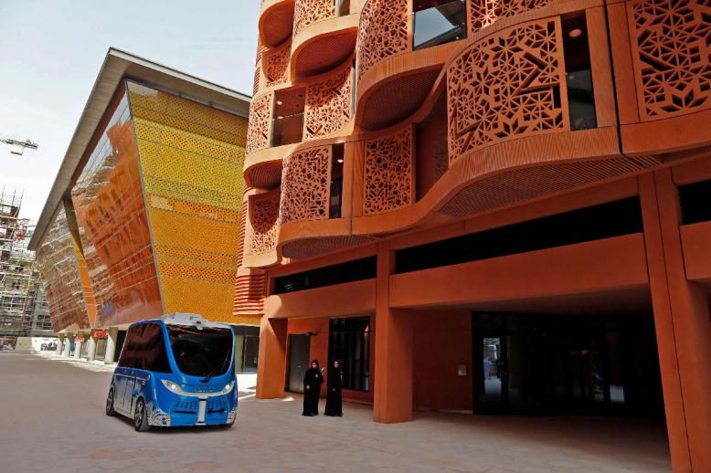 A driverless vehicle in a street at the site of Masdar City, a planned sustainable city project in Abu Dhabi