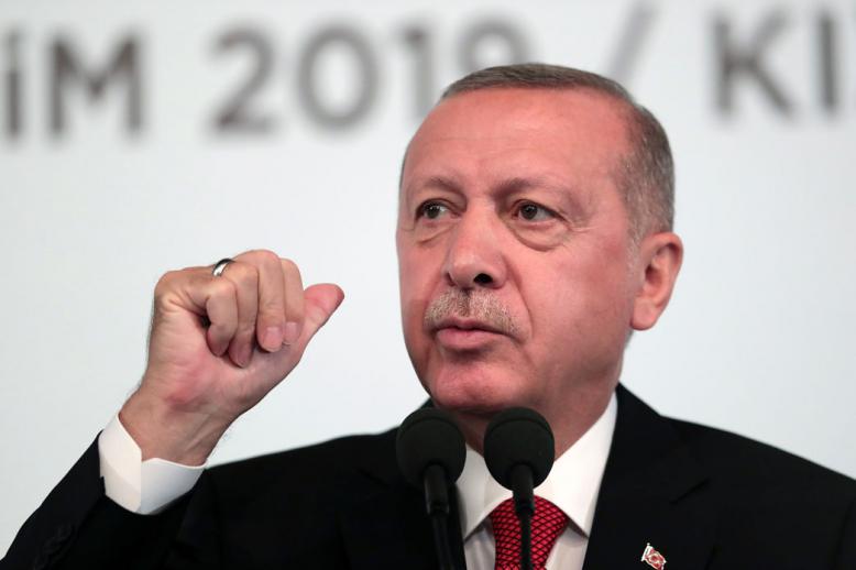 Turkey's President Recep Tayyip Erdogan talks to to supporters during an event in Ankara