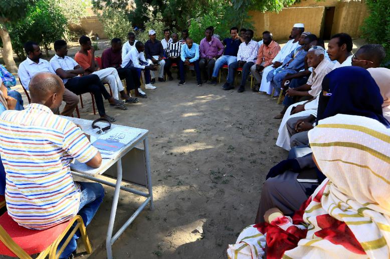 Members of resistance committees attend a meeting in Atbara at Nile State