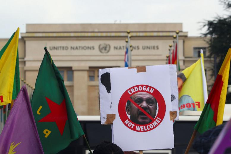 A placard depicting Turkey's President Recep Tayyip Erdogan is seen during a Kurds' demonstration in Geneva