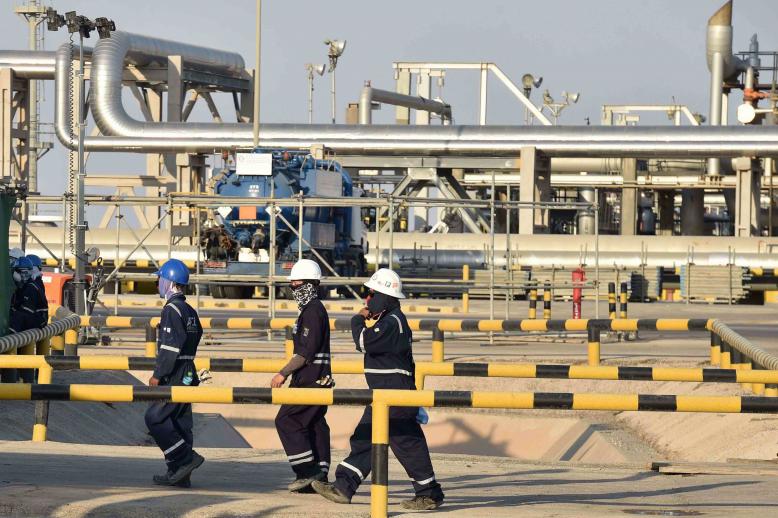 Employees of Aramco oil company at Saudi Arabia’s Abqaiq oil processing plant