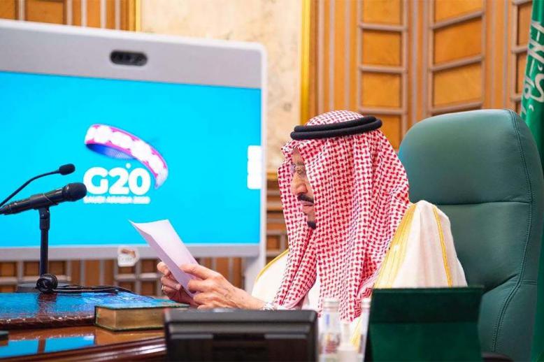 Saudi King Salman bin Abdulaziz speaks via video link during a virtual G20 summit on coronavirus disease