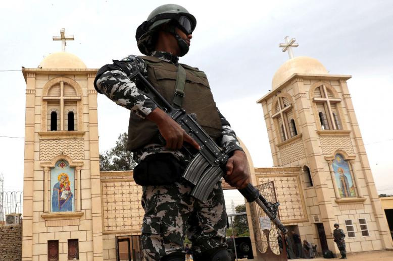 A member of Egypt's special police forces guards a Coptic church